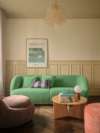 Sofacompany story case furnitures green sofa and pink chair