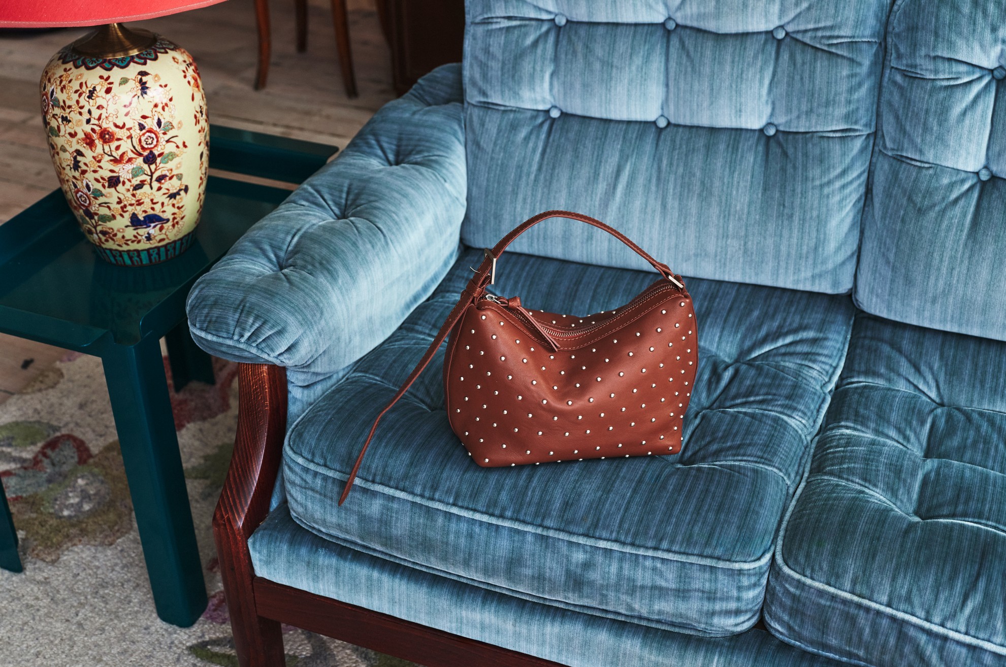 Becksöndergaard case story red bag on blue sofa